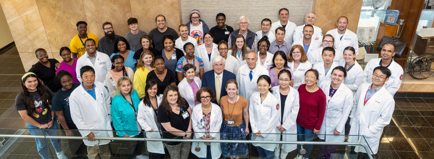 Group photo of physicians in white coats